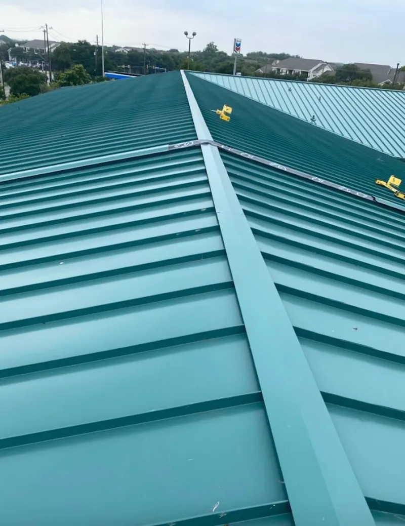 Green commercial metal roof ridge and valley for Metal Roof Repair in Leonia
