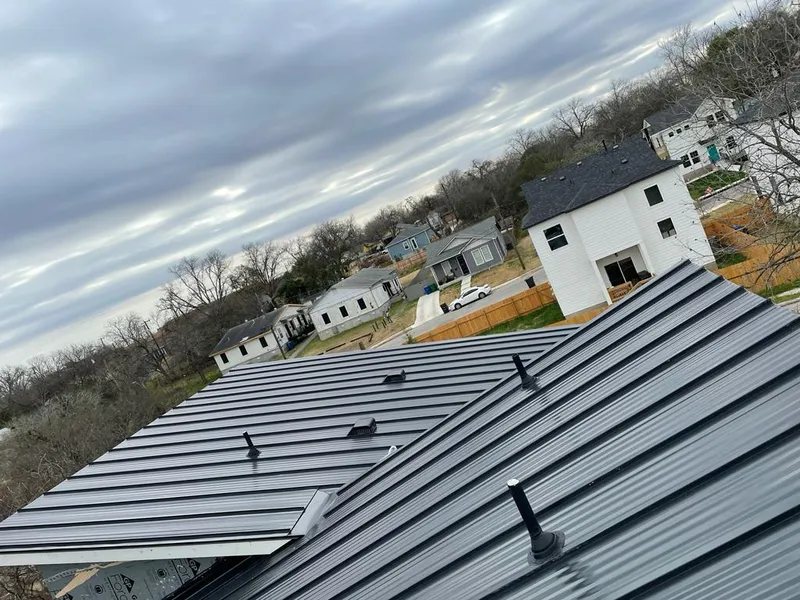 Standing seam metal roof panels with vents for Skylight Repair in Leonia